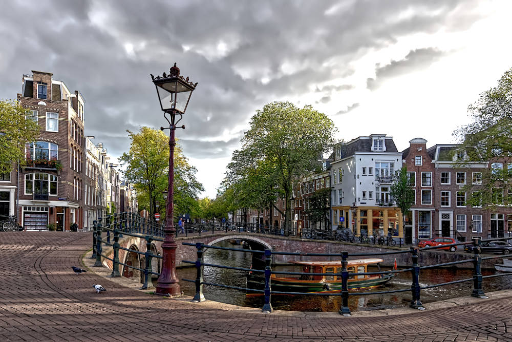 Reguliersgracht met welfbruggen op grootformaatfoto